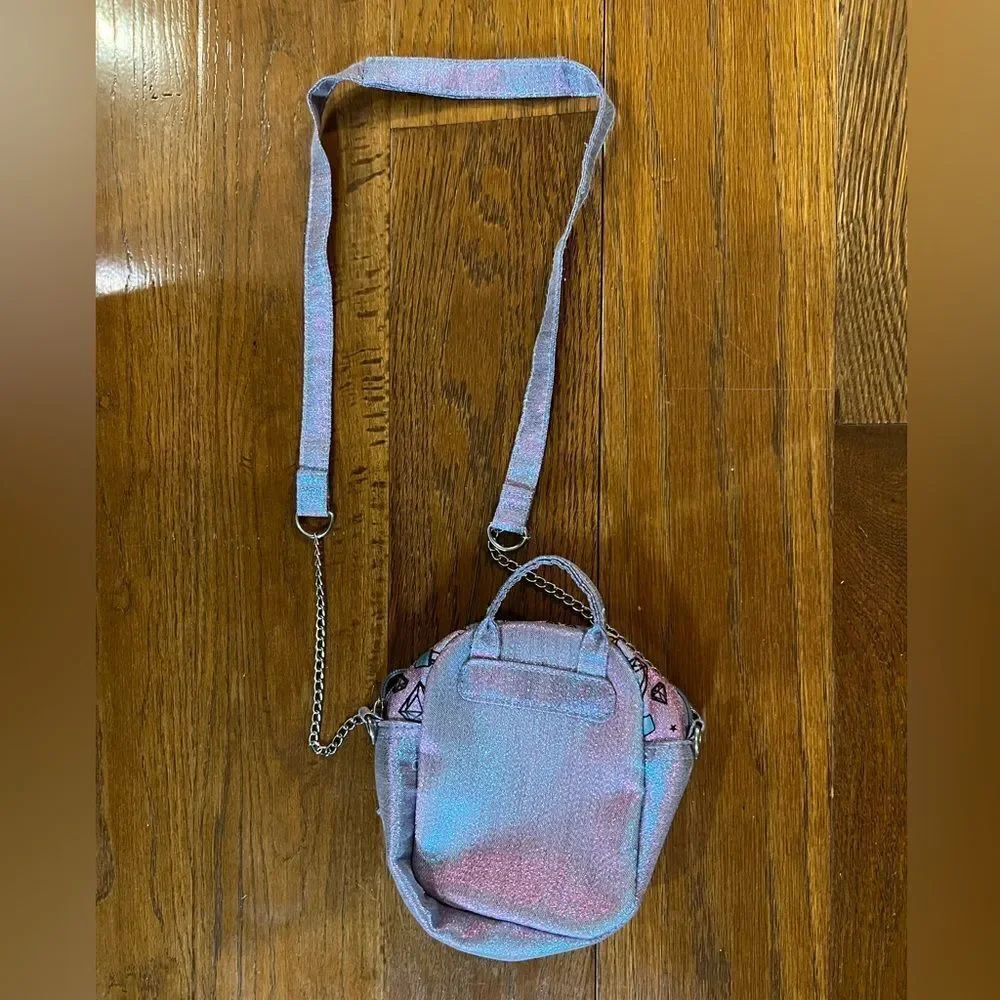 Gorgeous Glittery & metallic purple/blue w/graphics square Claire’s crossbody